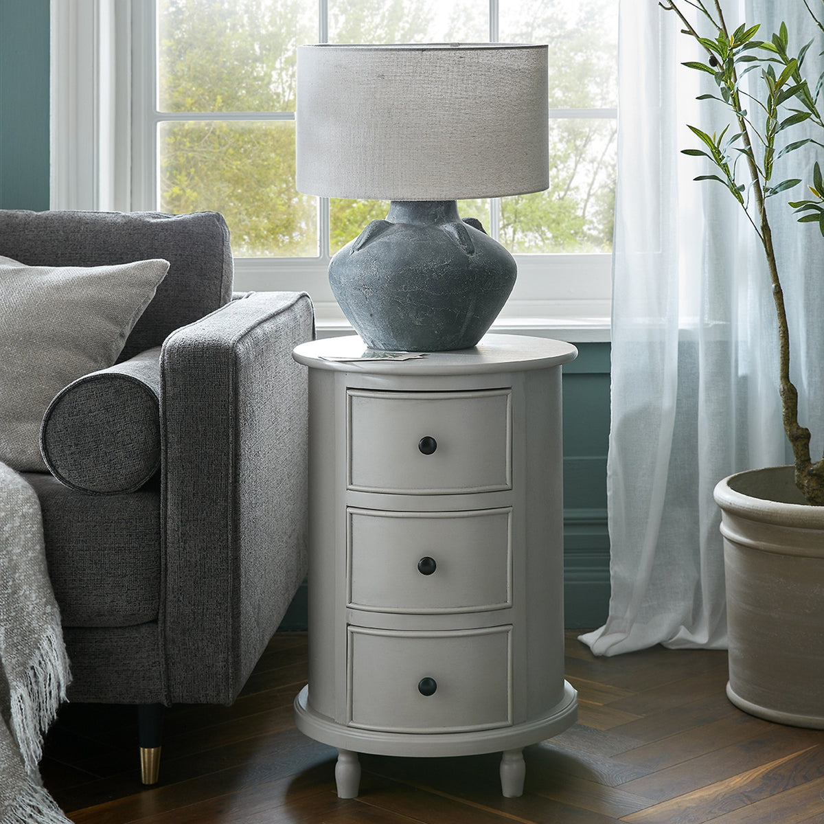 The Camden Collection 3 Drawer Round Side Table - image 1